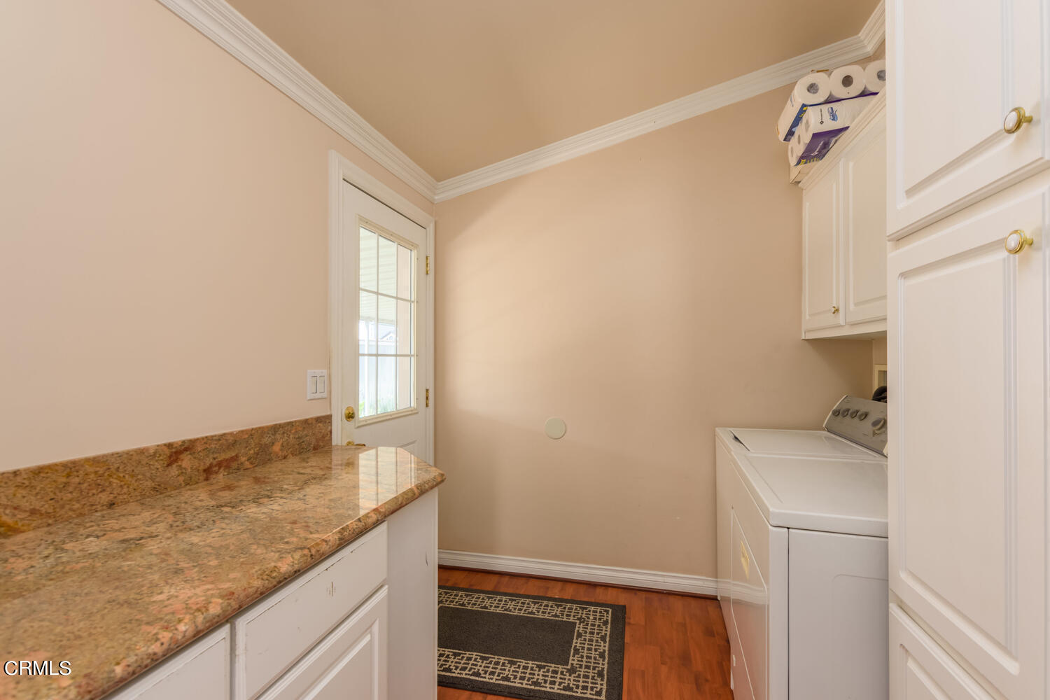11405 Darling Road, Unit 1 Ventura, CA 93004 - Photo 19 of 31 a bathroom with a granite countertop sink and a vanity