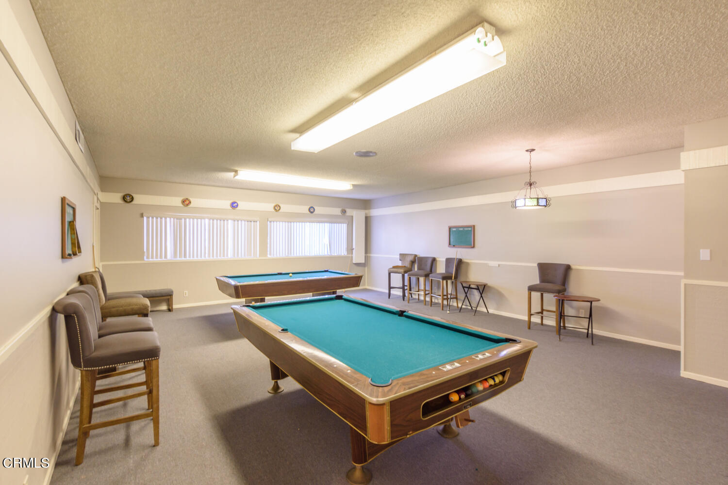 11405 Darling Road, Unit 1 Ventura, CA 93004 - Photo 29 of 31 a living room with furniture pool table and window