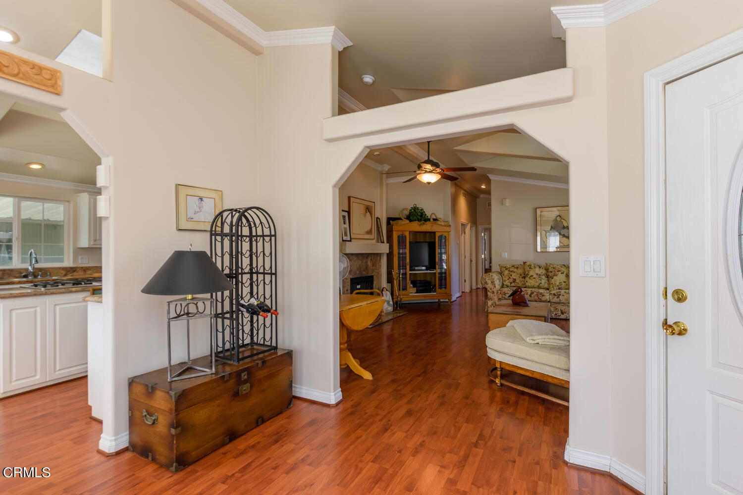 11405 Darling Road, Unit 1 Ventura, CA 93004 - Photo 5 of 31 a living room with furniture a dining table and chairs with wooden floor