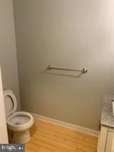 4742 Pine Street, Unit 104 Philadelphia, PA 19143 - Photo 11 of 12 a bathroom with a toilet and a sink