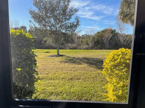 a view of an outdoor space and a yard