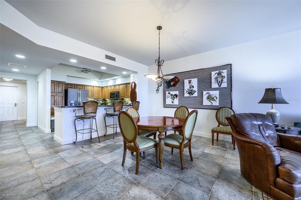 3313 Sunset Key Circle, Unit 104 Punta Gorda, FL 33955 - Photo 18 of 57 a view of a dining room with furniture