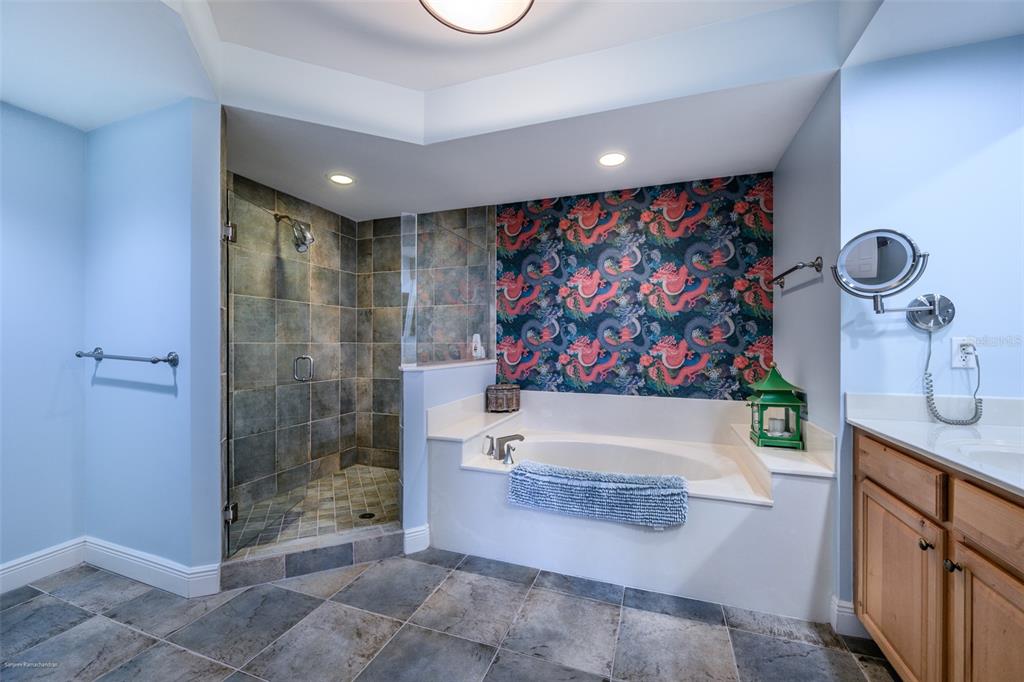 3313 Sunset Key Circle, Unit 104 Punta Gorda, FL 33955 - Photo 33 of 57 a bathroom with a bathtub and shower