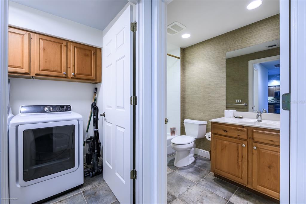 3313 Sunset Key Circle, Unit 104 Punta Gorda, FL 33955 - Photo 38 of 57 a view of bathroom with a toilet sink and mirror
