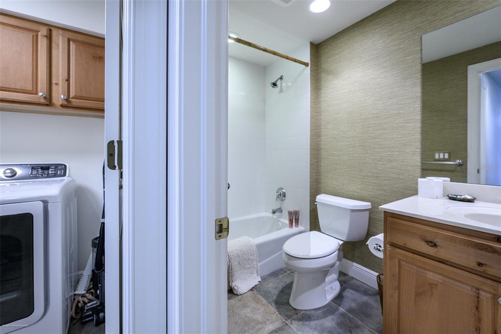 3313 Sunset Key Circle, Unit 104 Punta Gorda, FL 33955 - Photo 44 of 57 a bathroom with a sink toilet and shower