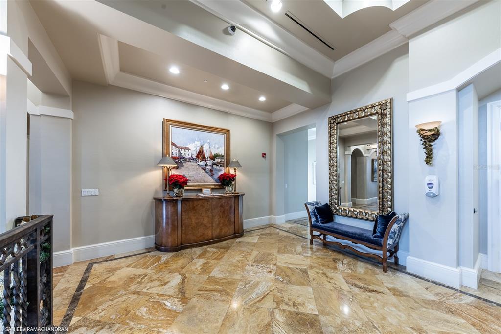 3313 Sunset Key Circle, Unit 104 Punta Gorda, FL 33955 - Photo 53 of 57 a bed room with furniture and wooden floor