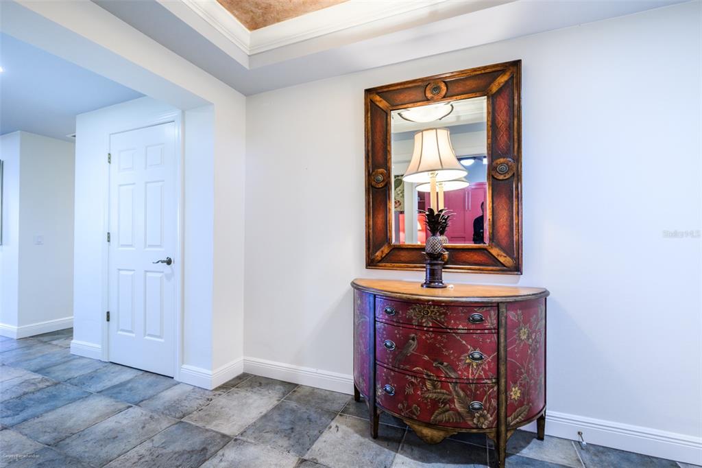 3313 Sunset Key Circle, Unit 104 Punta Gorda, FL 33955 - Photo 6 of 57 a view of a hallway with entryway