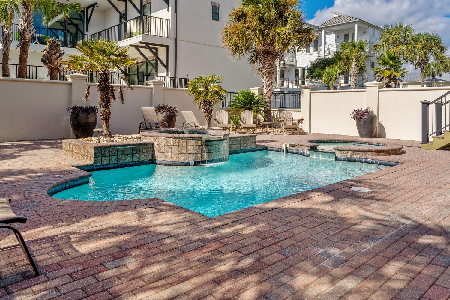 216 Sandtrap Road Miramar Beach, FL 32550 - Photo 3 of 66 a front view of a house with garden