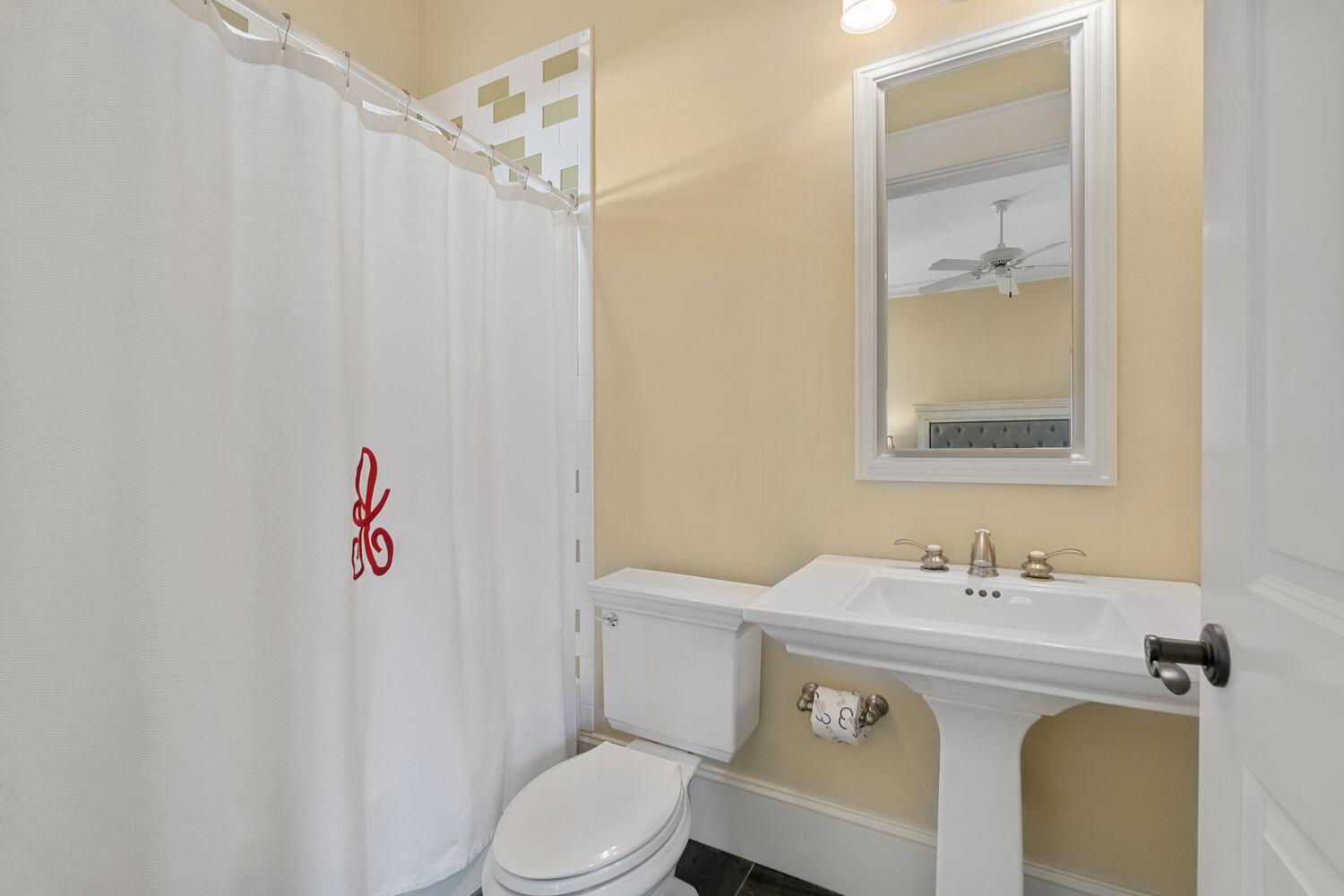 216 Sandtrap Road Miramar Beach, FL 32550 - Photo 43 of 66 a bathroom with a sink a toilet and shower