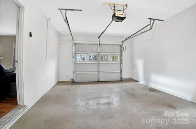 a view of a room with wooden walls
