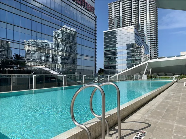 a living room with a couch and a table