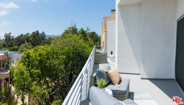 a view of balcony with seating space