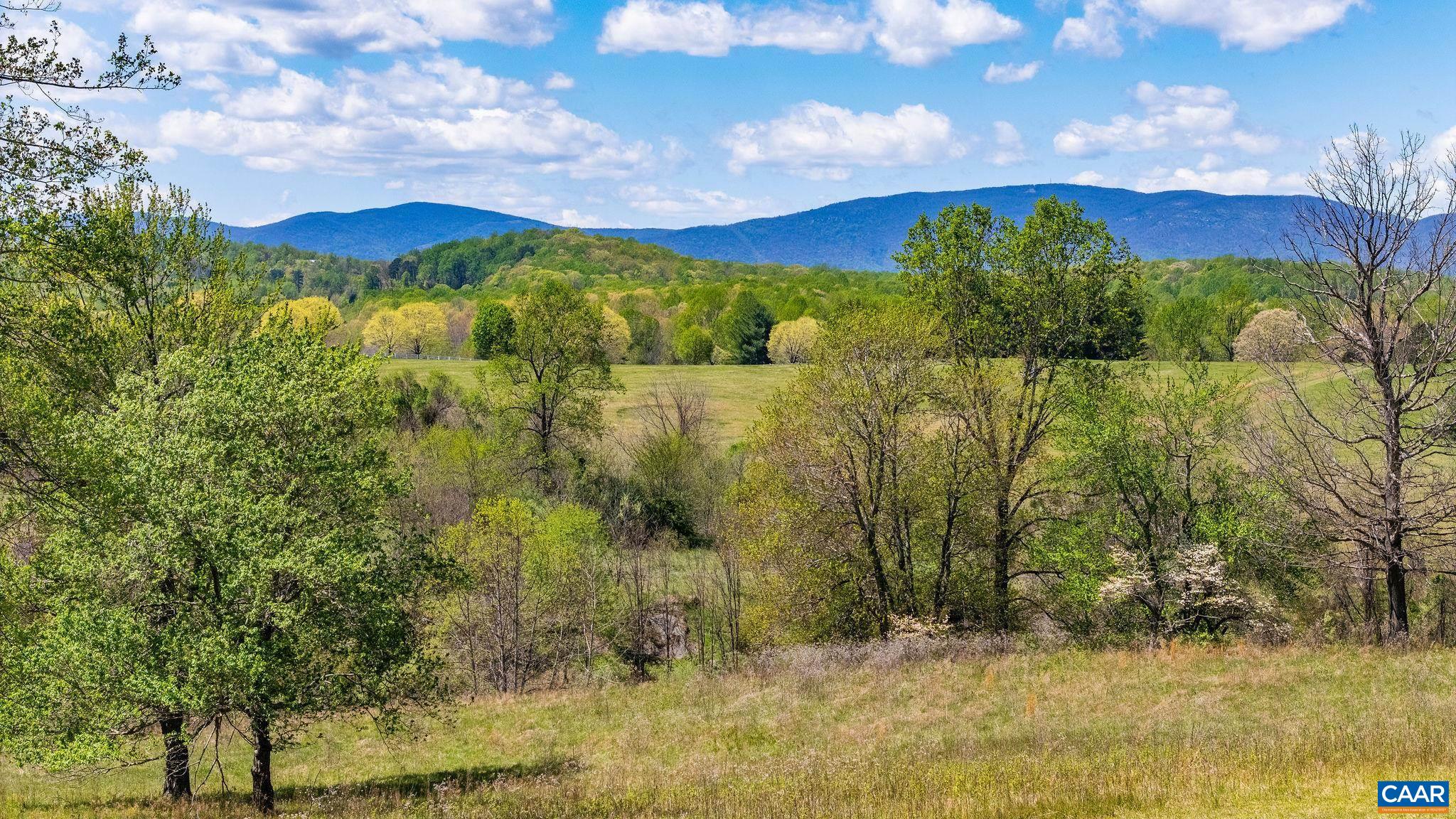 a view of a lake with a mountain in the background