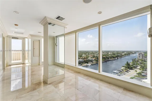 a view of a living room and window