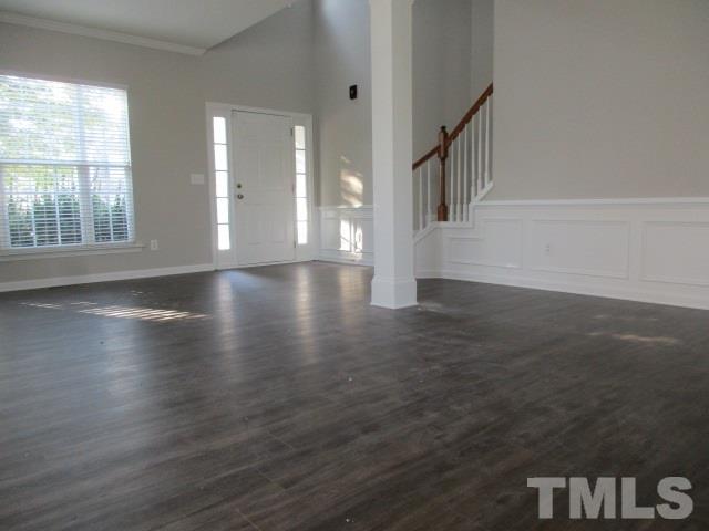 7714 San Gabriel Street Raleigh, NC 27613 - Photo 2 of 25 a view of an entryway with wooden floor