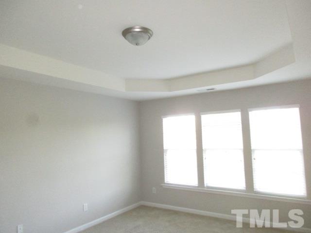 7714 San Gabriel Street Raleigh, NC 27613 - Photo 12 of 25 a view of an empty room with a window