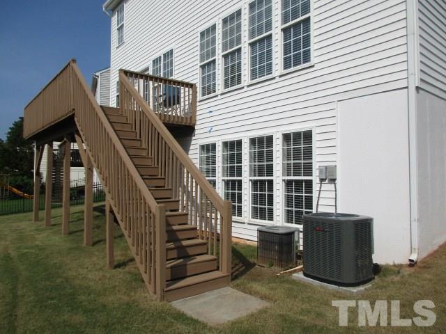 7714 San Gabriel Street Raleigh, NC 27613 - Photo 17 of 25 a view of a patio with table and chairs