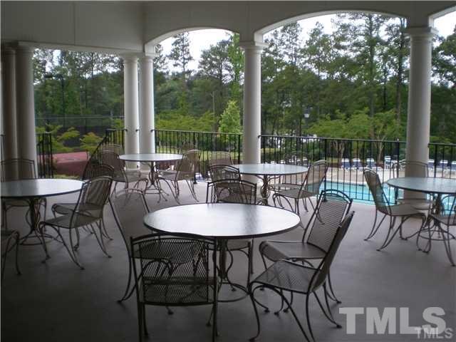 7714 San Gabriel Street Raleigh, NC 27613 - Photo 22 of 25 a view of a dining room with furniture window and outside view