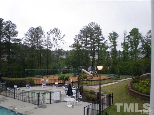 7714 San Gabriel Street Raleigh, NC 27613 - Photo 24 of 25 a view of a terrace with sitting area