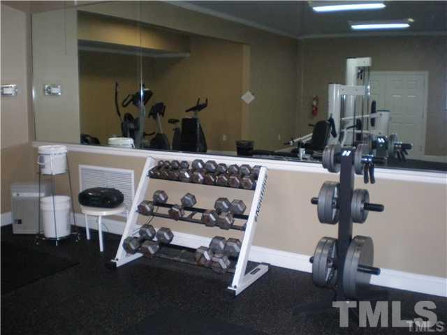 7714 San Gabriel Street Raleigh, NC 27613 - Photo 25 of 25 a room with gym equipment