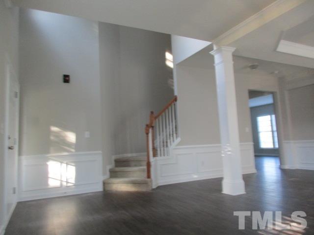 7714 San Gabriel Street Raleigh, NC 27613 - Photo 8 of 25 a view of entryway and hall with wooden floor