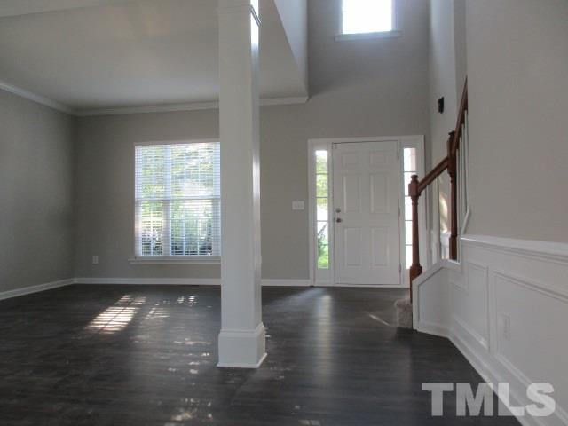 7714 San Gabriel Street Raleigh, NC 27613 - Photo 10 of 25 a view of empty room with wooden floor and fan