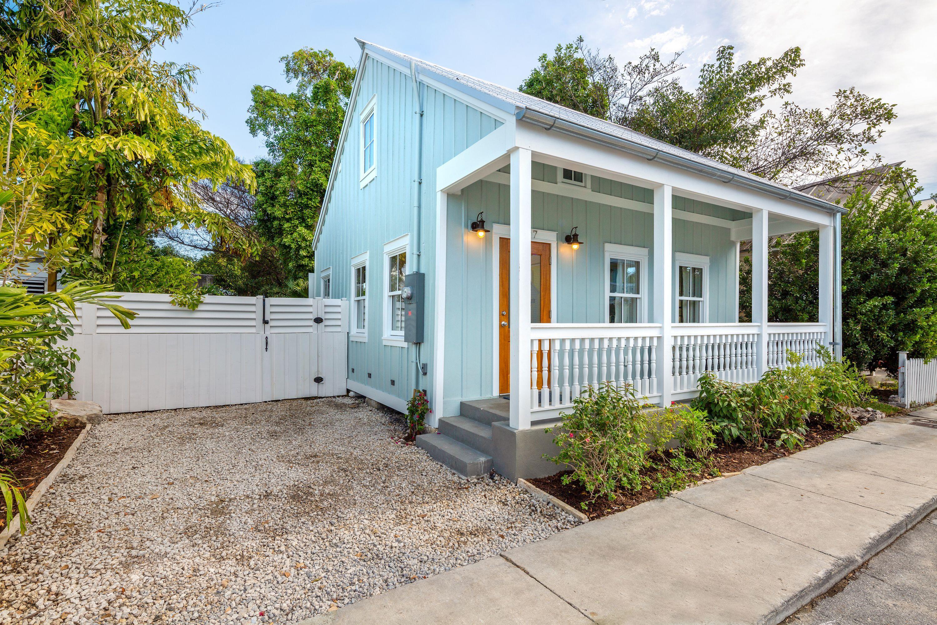 1007 Thomas Street Key West, FL 33040 - Photo 12 of 31 front view of a house with a yard