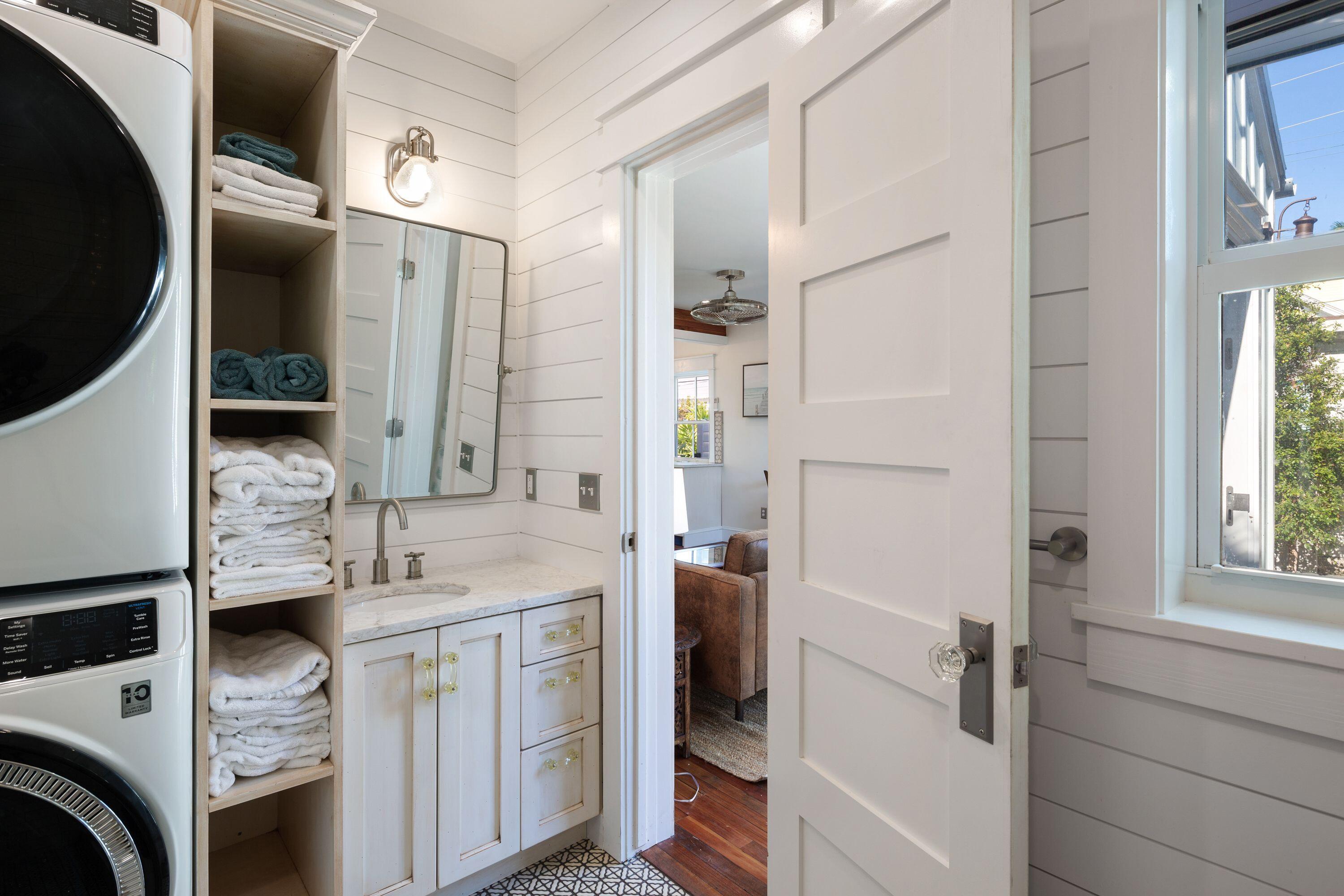 1007 Thomas Street Key West, FL 33040 - Photo 27 of 31 a bathroom with a sink a washer and dryer