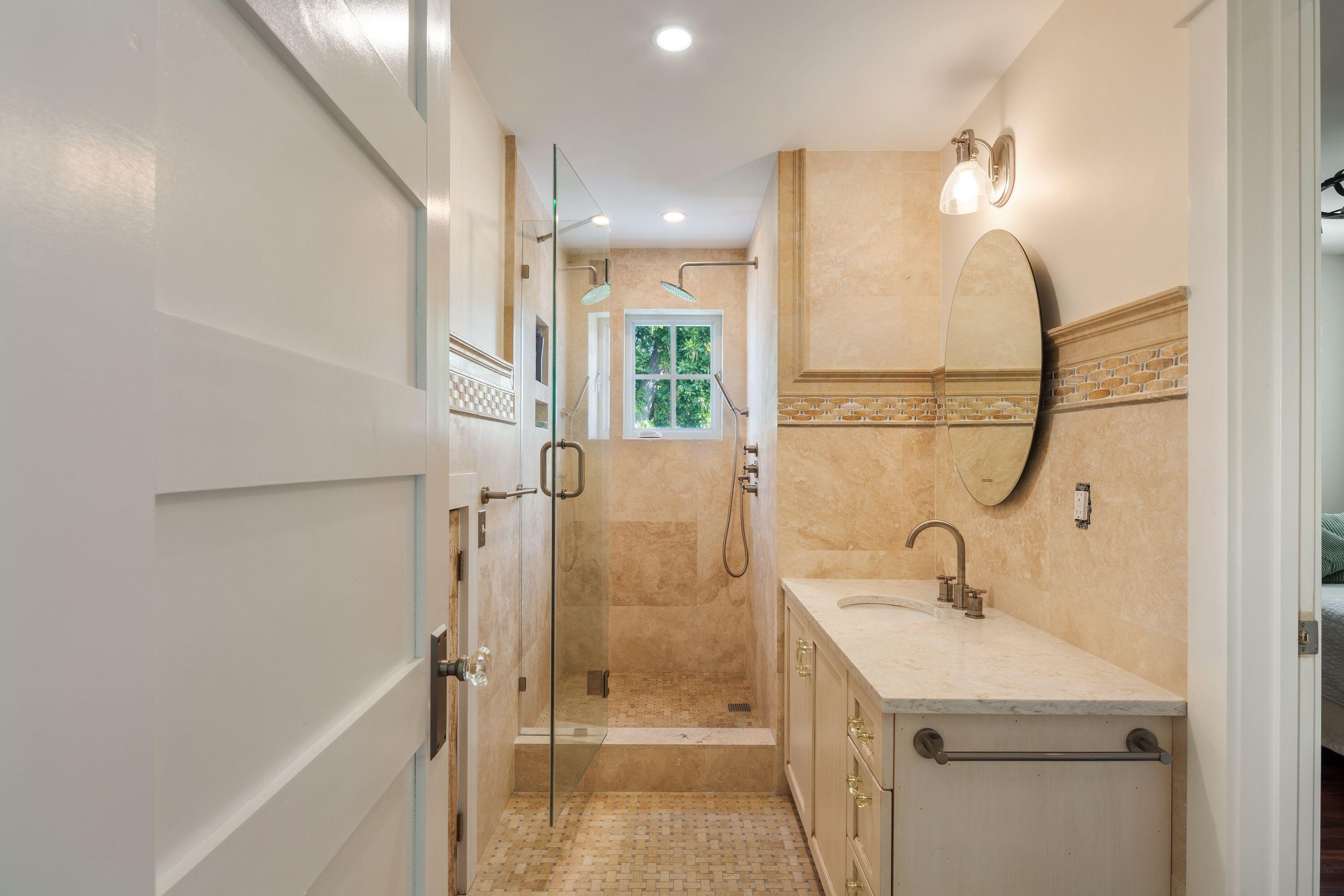 1007 Thomas Street Key West, FL 33040 - Photo 7 of 31 a bathroom with a sink a toilet and shower