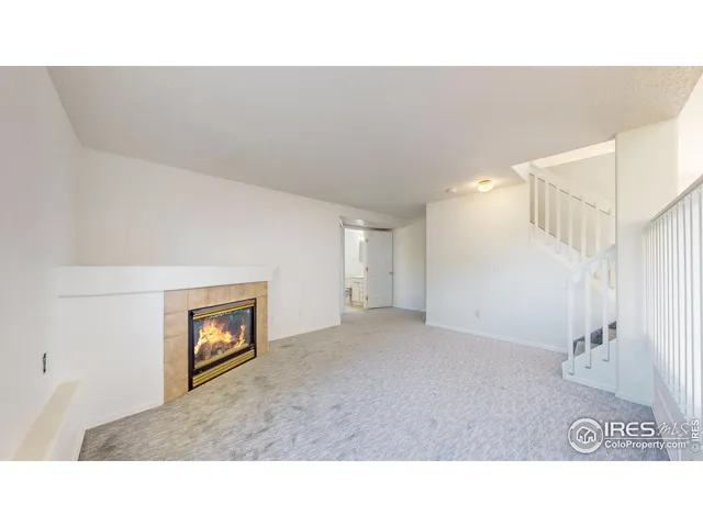 a black and white photo of a living room