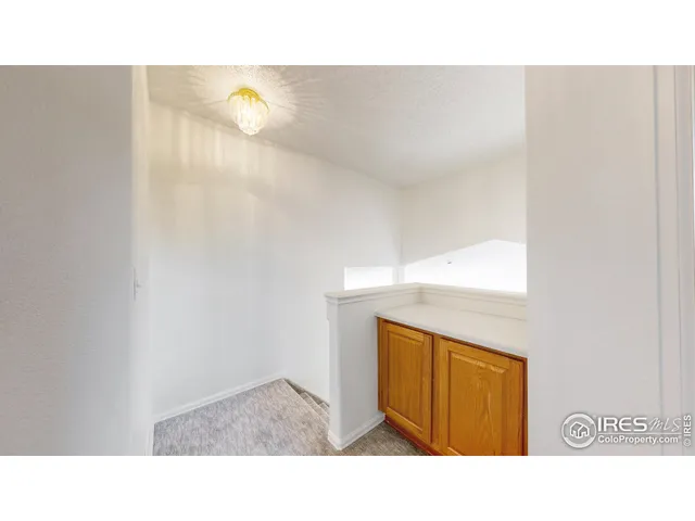 a black and white photo of a living room