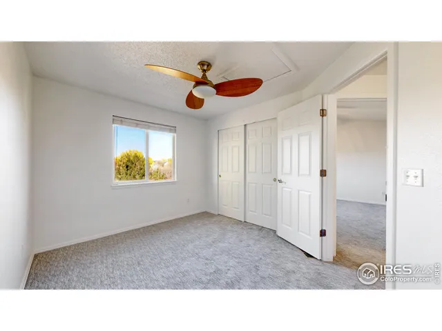 a bathroom with a sink toilet a mirror and shower