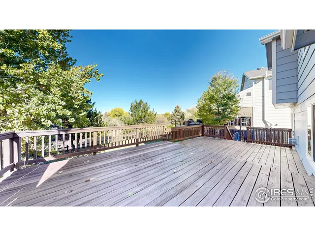 a view of house with a yard