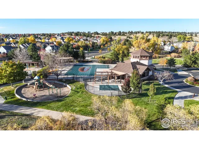 a view of a street with a yard