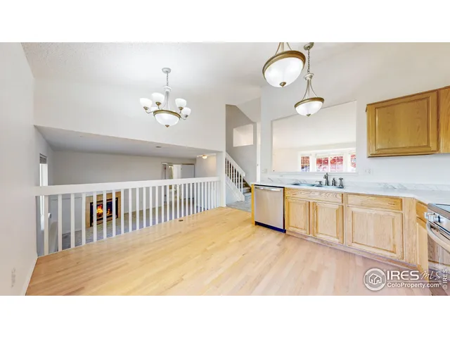 a bathroom with a sink a mirror and a window