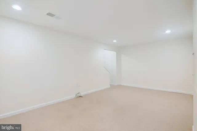 an empty room with an entryway