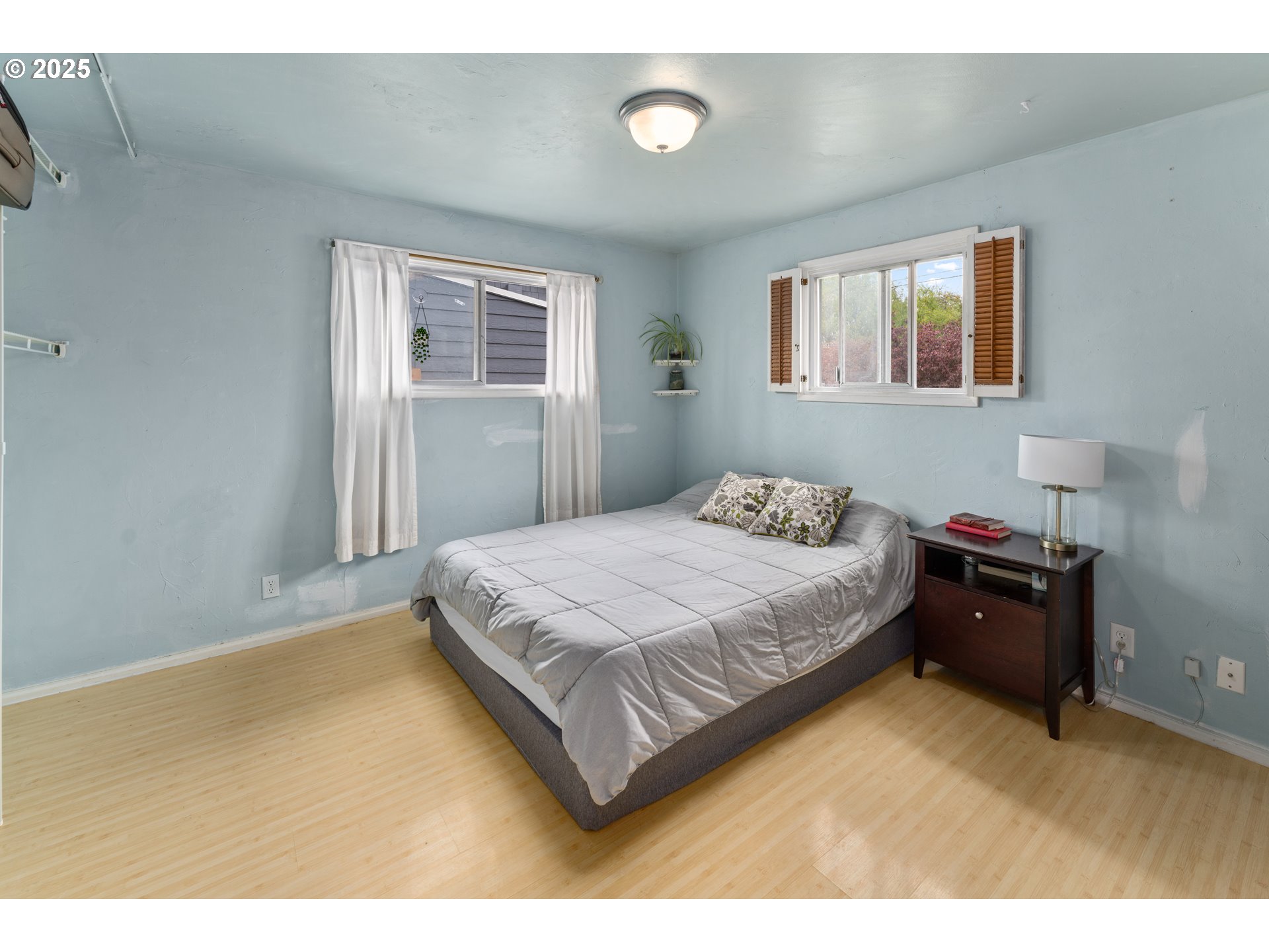 436 West M Street Springfield, OR 97477 - Photo 15 of 22 a bedroom with a bed and a night stand