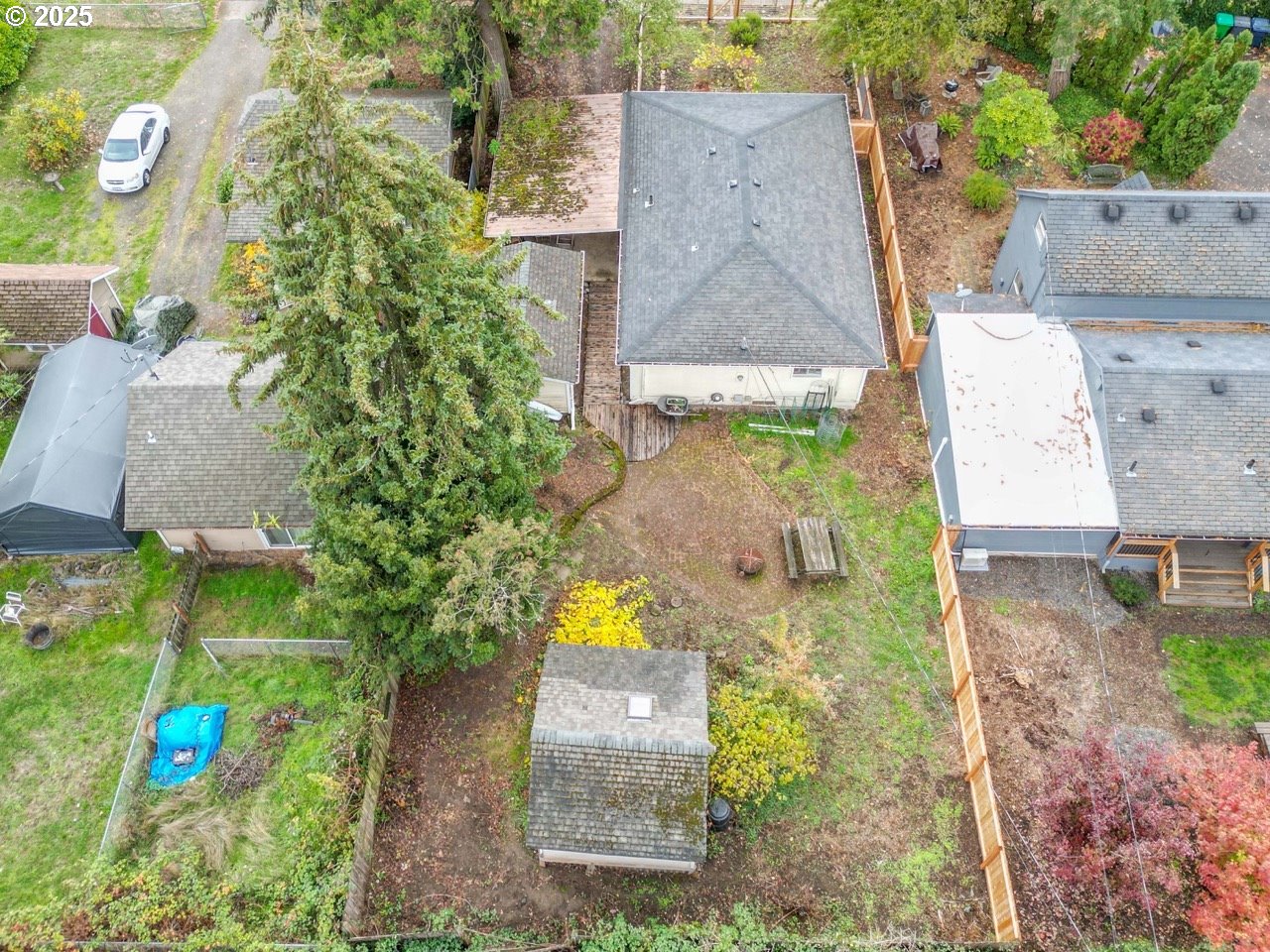436 West M Street Springfield, OR 97477 - Photo 20 of 22 an aerial view of a house with a yard and a large tree