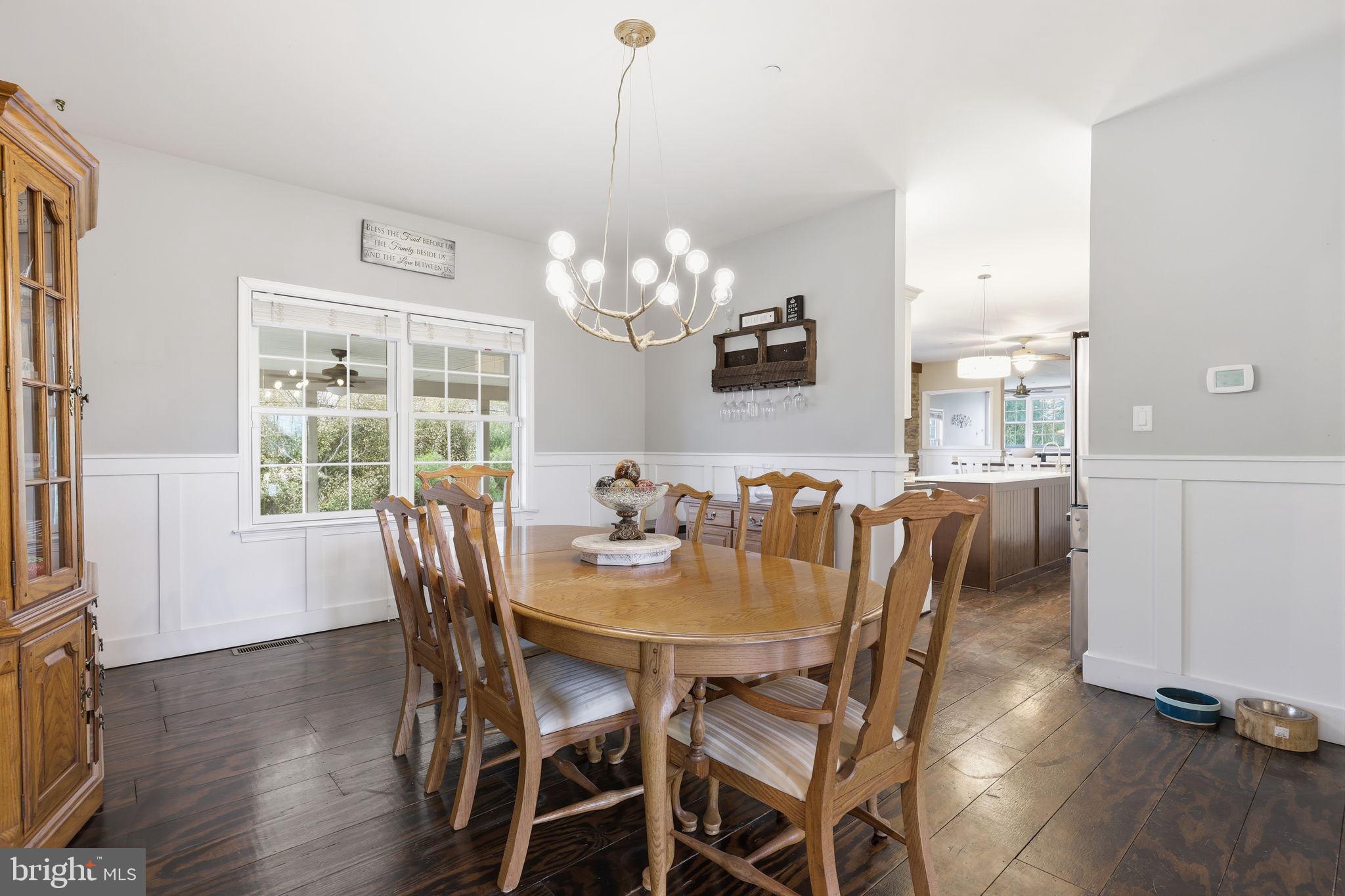 3852 Dark Hollow Road Furlong, PA 18925 - Photo 20 of 52 a view of a dining room with furniture window and wooden floor