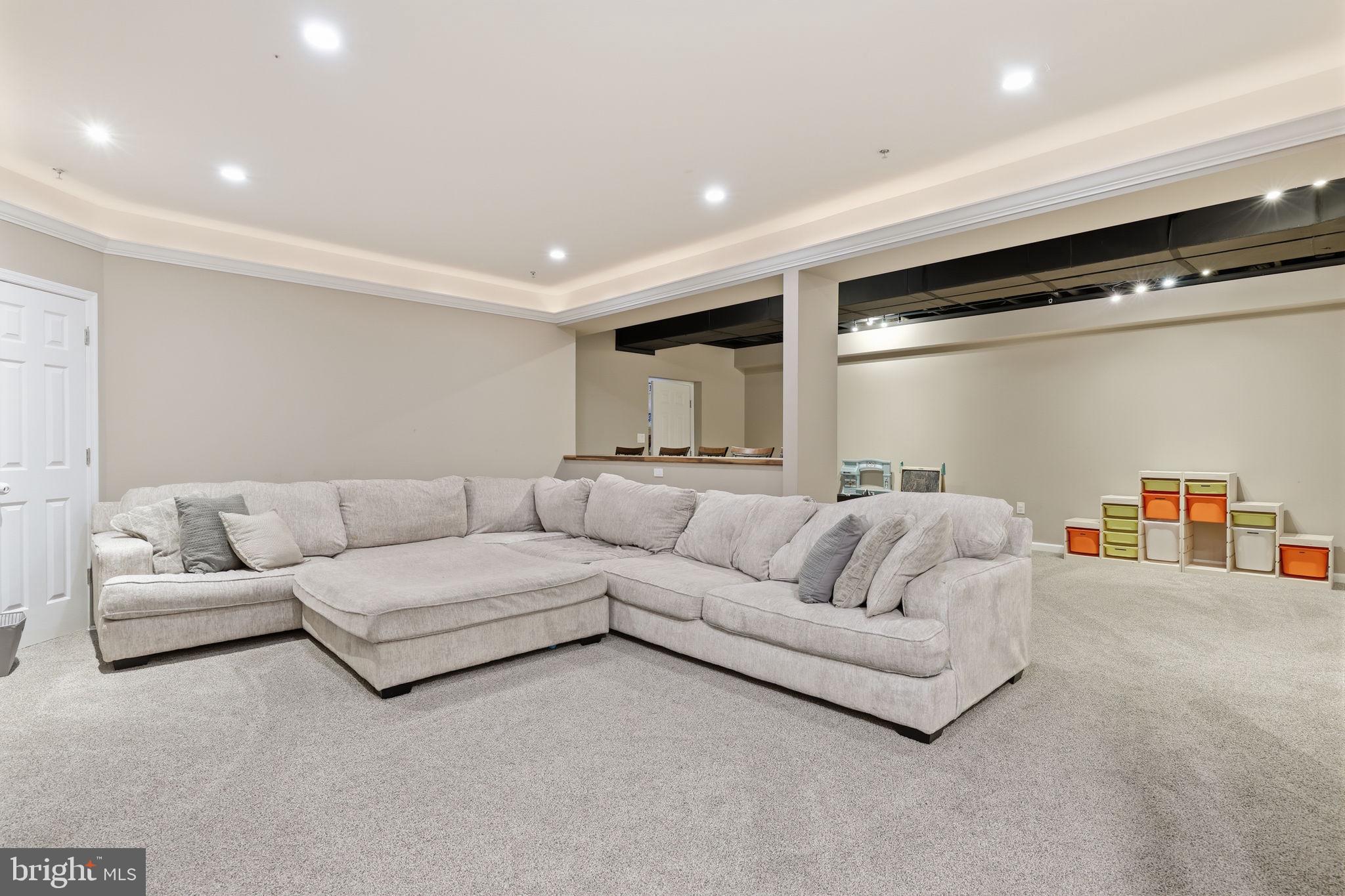 3852 Dark Hollow Road Furlong, PA 18925 - Photo 24 of 52 a living room with furniture and a couch