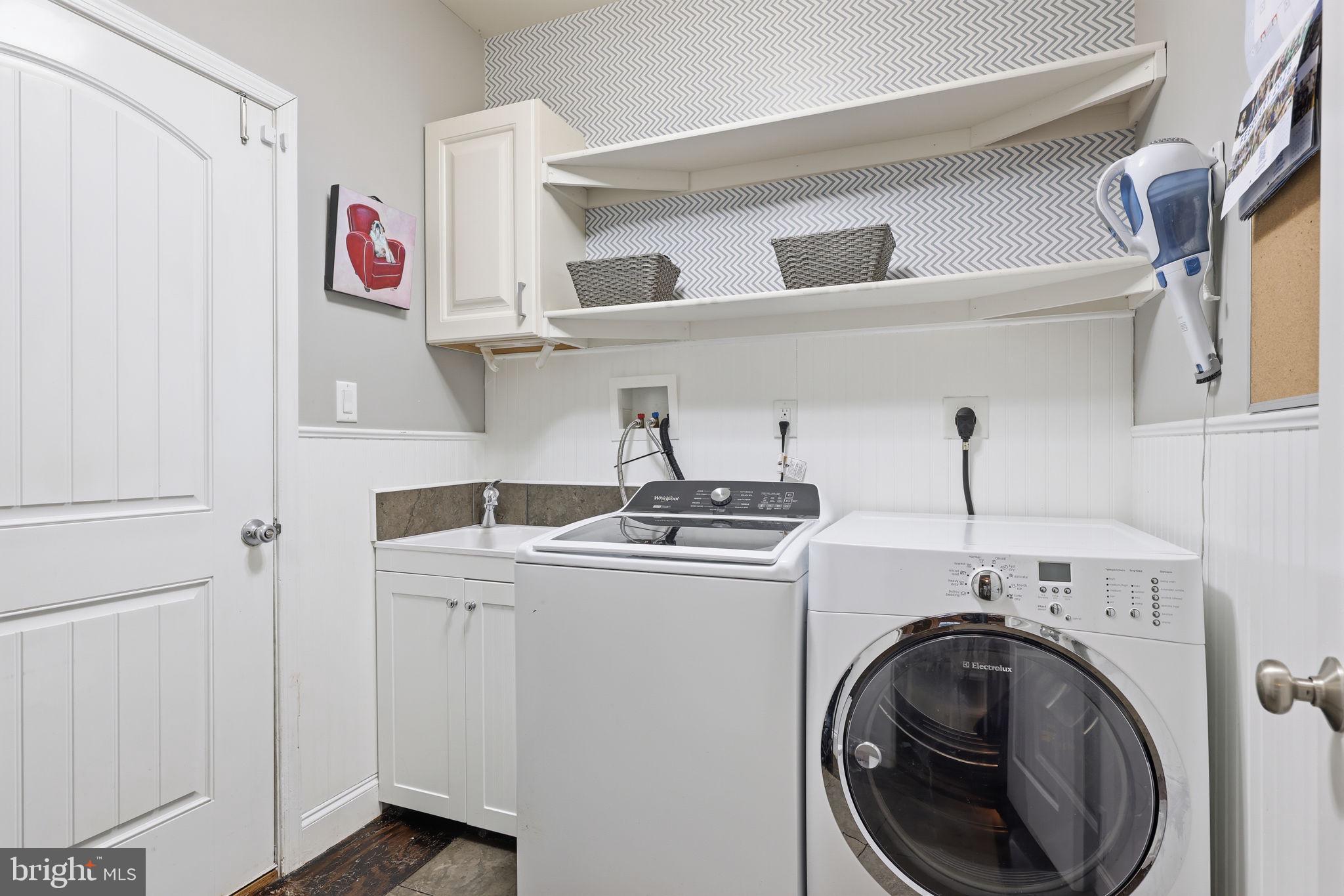3852 Dark Hollow Road Furlong, PA 18925 - Photo 31 of 52 a utility room with dryer and washer
