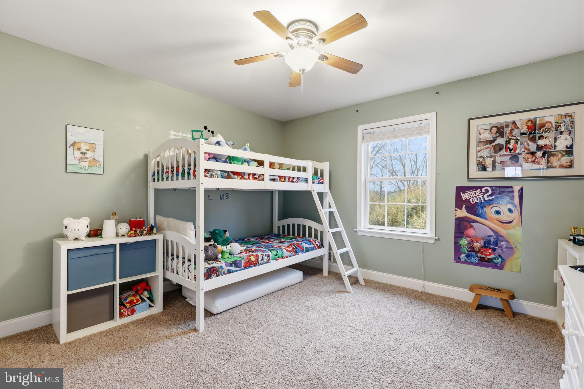 3852 Dark Hollow Road Furlong, PA 18925 - Photo 33 of 52 a bedroom with a bed and a window