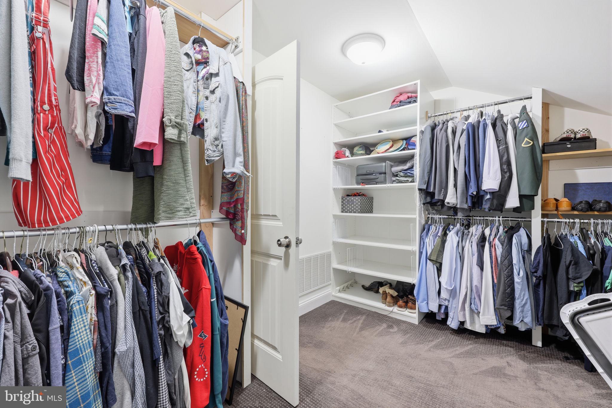 3852 Dark Hollow Road Furlong, PA 18925 - Photo 41 of 52 a view of walk in closet with clothes