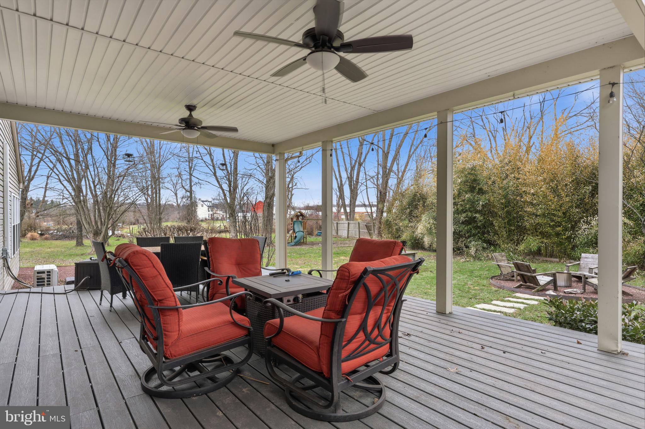 3852 Dark Hollow Road Furlong, PA 18925 - Photo 45 of 52 a outdoor space with patio couch and wooden floor