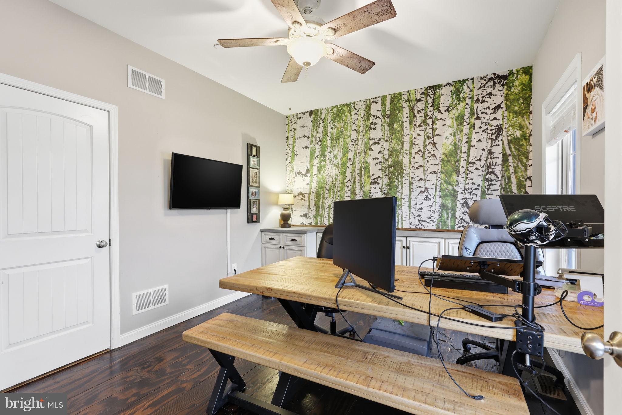 3852 Dark Hollow Road Furlong, PA 18925 - Photo 6 of 52 a view of a workspace with furniture and a window