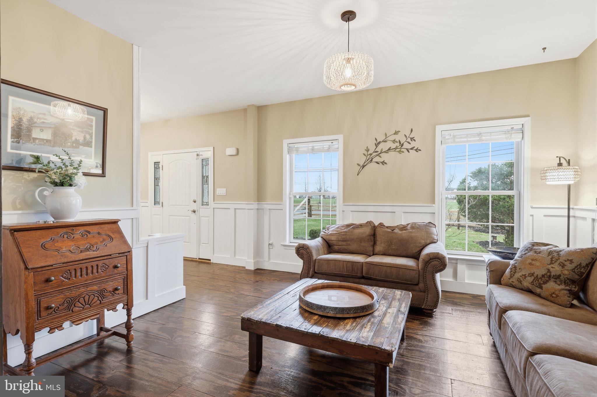 3852 Dark Hollow Road Furlong, PA 18925 - Photo 9 of 52 a living room with furniture and a flat screen tv