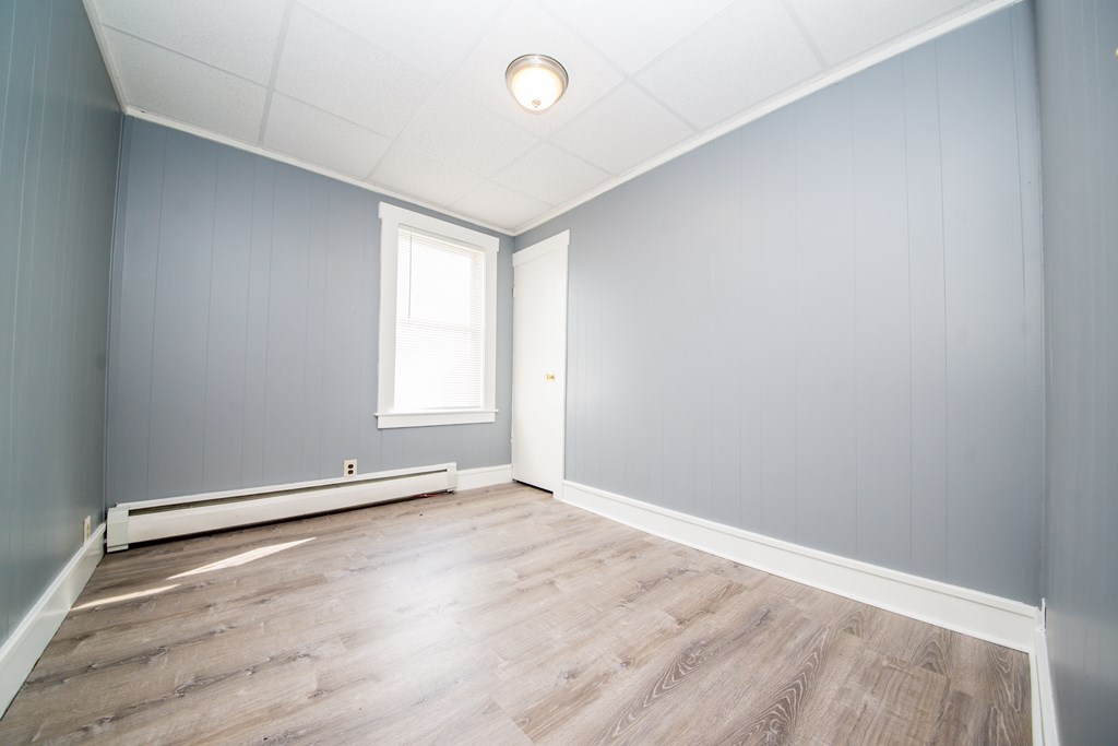 130 Baker Street Fall River, MA 02721 - Photo 12 of 21 a view of an empty room with a window