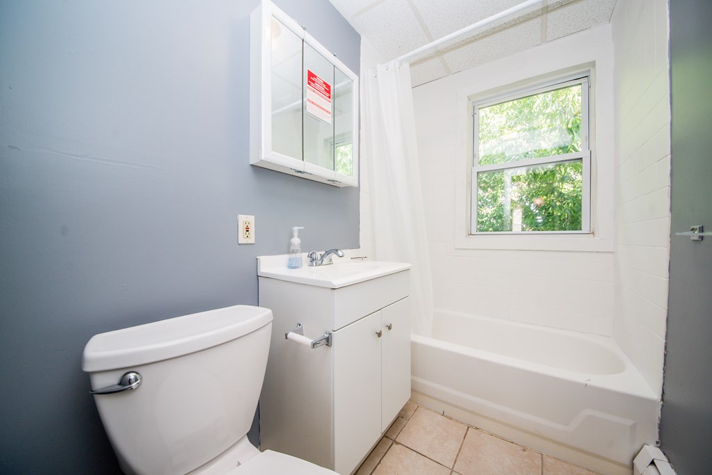 130 Baker Street Fall River, MA 02721 - Photo 16 of 21 a bathroom with a sink toilet and bathtub