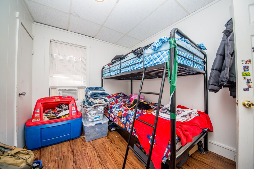 130 Baker Street Fall River, MA 02721 - Photo 21 of 21 a bedroom with double bed and a window