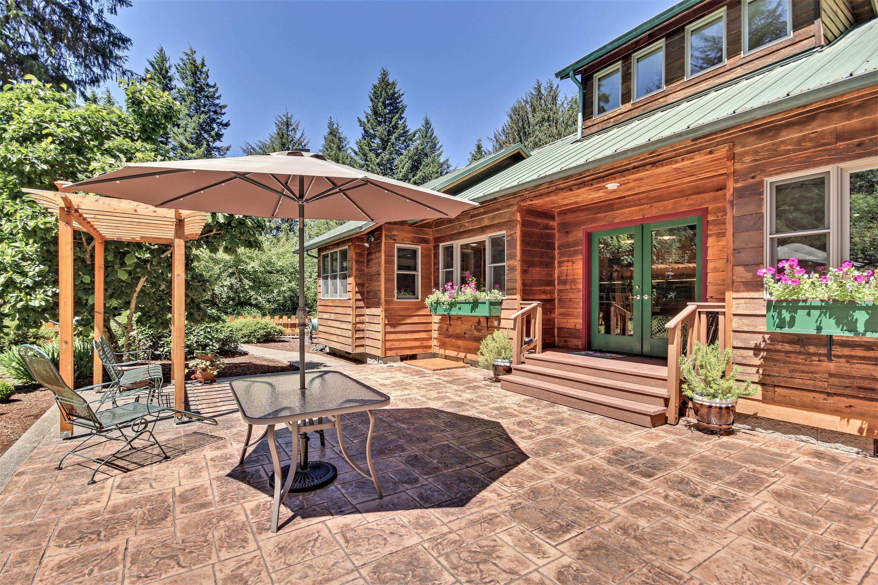 1754 Old River Road Northeast Siletz, OR 97380 - Photo 4 of 42 Stamped concrete Patio